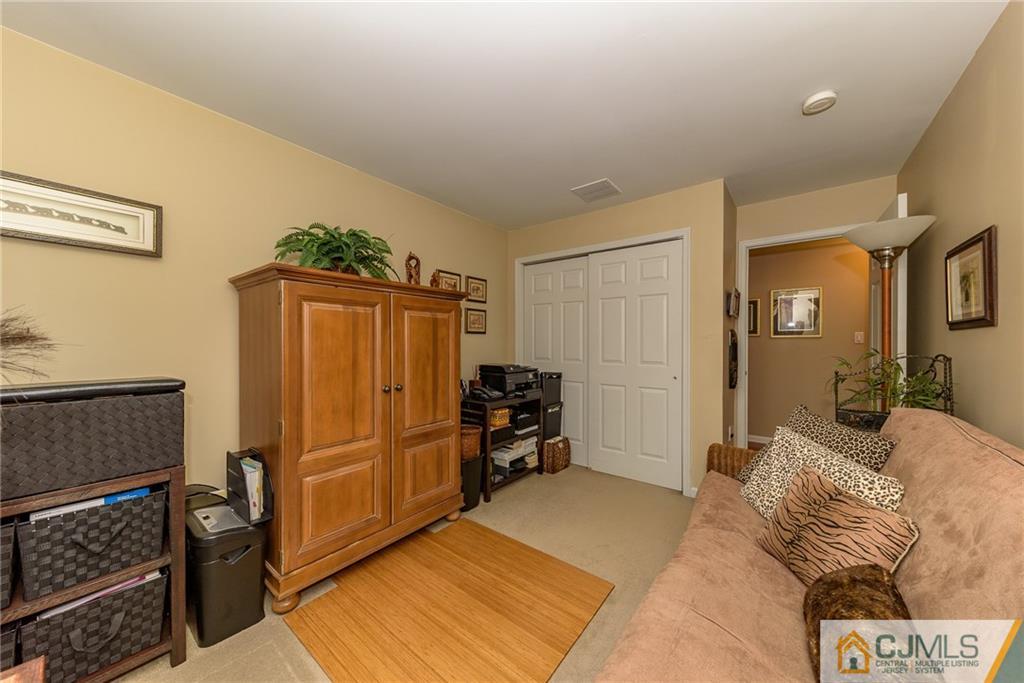 3 Rock Run Road East Windsor, NJ 08520 - Photo 13 of 25 a bedroom with a bed and a dresser