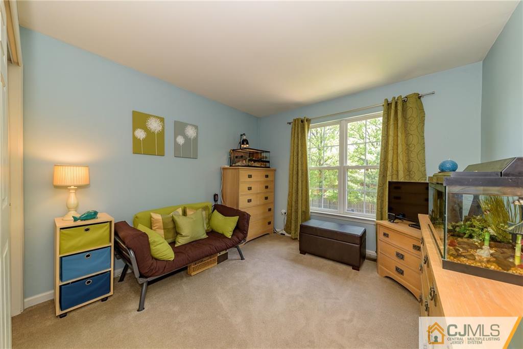 3 Rock Run Road East Windsor, NJ 08520 - Photo 14 of 25 a living room with furniture and a flat screen tv
