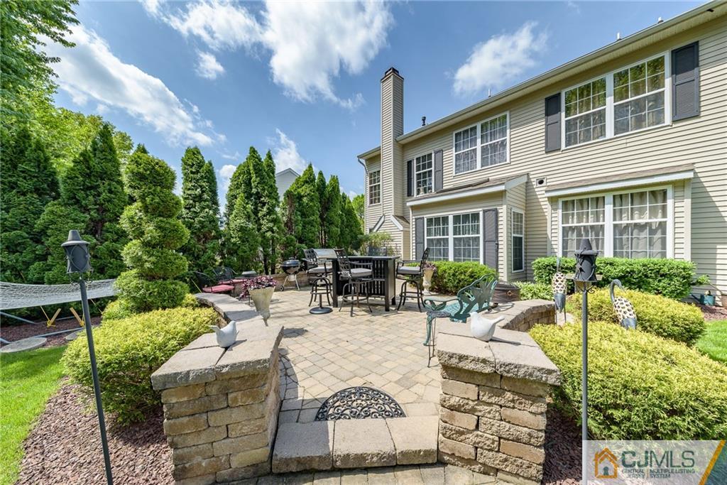 3 Rock Run Road East Windsor, NJ 08520 - Photo 22 of 25 a view of a house with backyard and sitting area