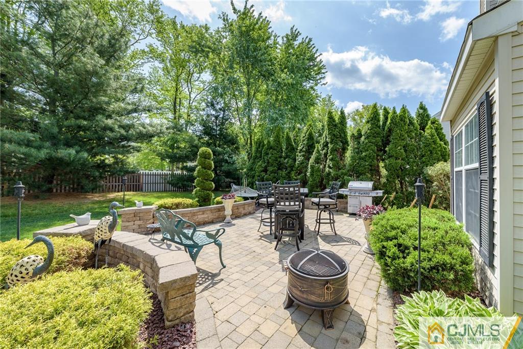 3 Rock Run Road East Windsor, NJ 08520 - Photo 23 of 25 a view of a patio with chairs and a table