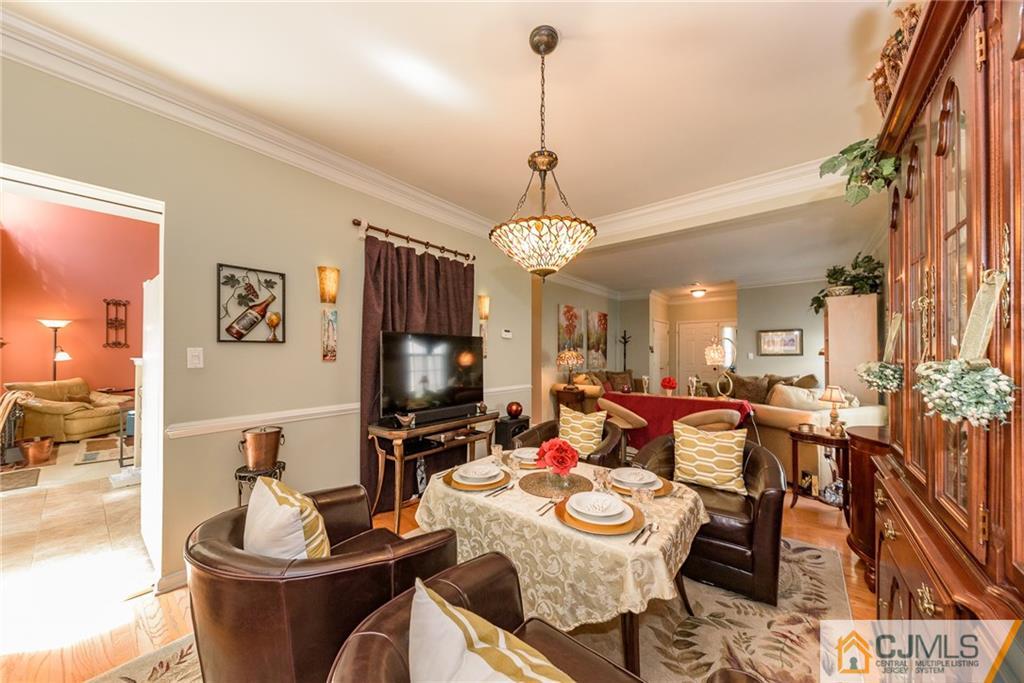 3 Rock Run Road East Windsor, NJ 08520 - Photo 5 of 25 a dining room with furniture a chandelier and window