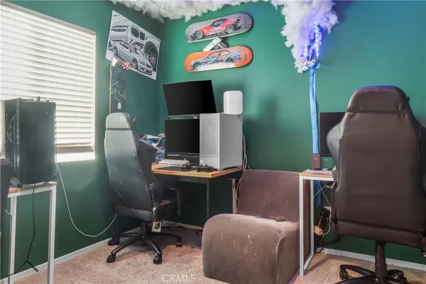 a workspace with furniture and lamp