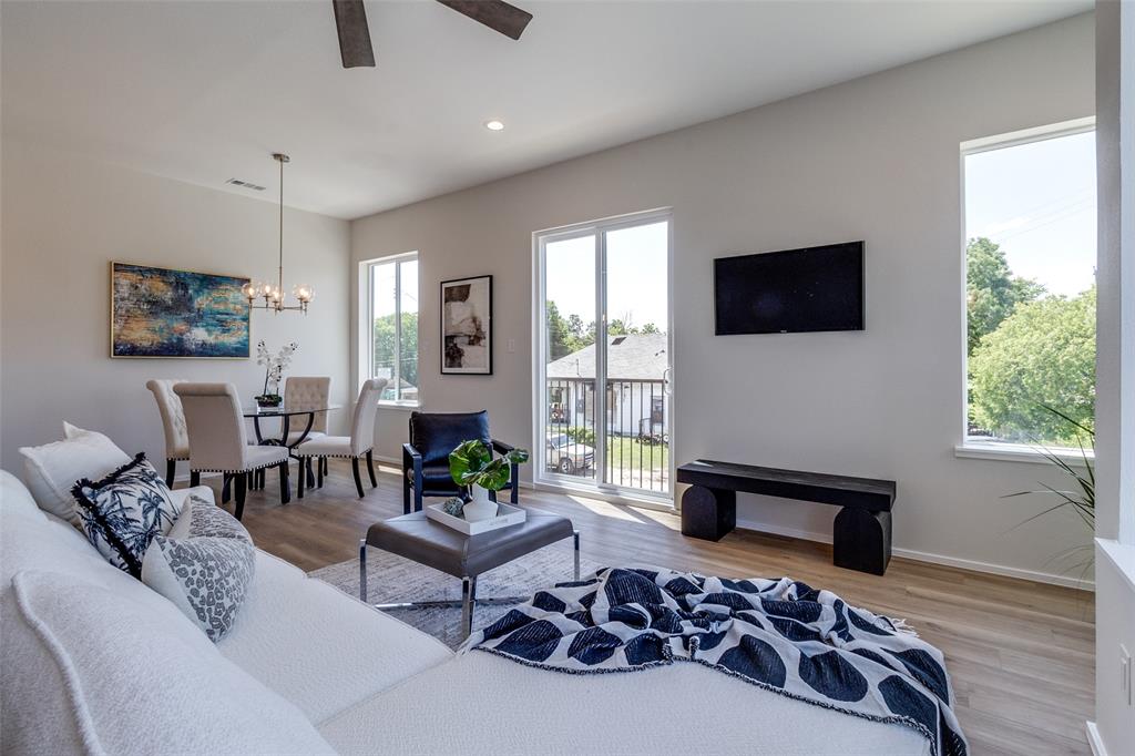 3308 Birmingham Avenue, Unit A1 Dallas, TX 75210 - Photo 15 of 33 a living room with furniture and a flat screen tv