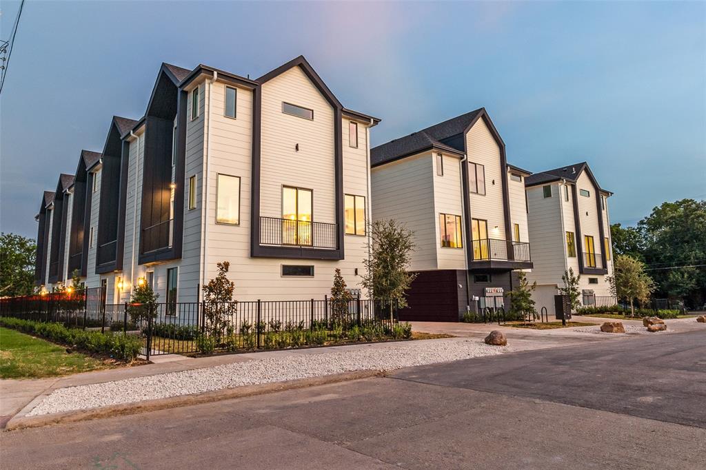 3308 Birmingham Avenue, Unit A1 Dallas, TX 75210 - Photo 2 of 33 a front view of a house with a yard