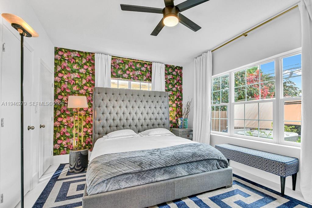 4722 Southwest 5th Street Miami, FL 33134 - Photo 8 of 18 a bedroom with a bed and a window