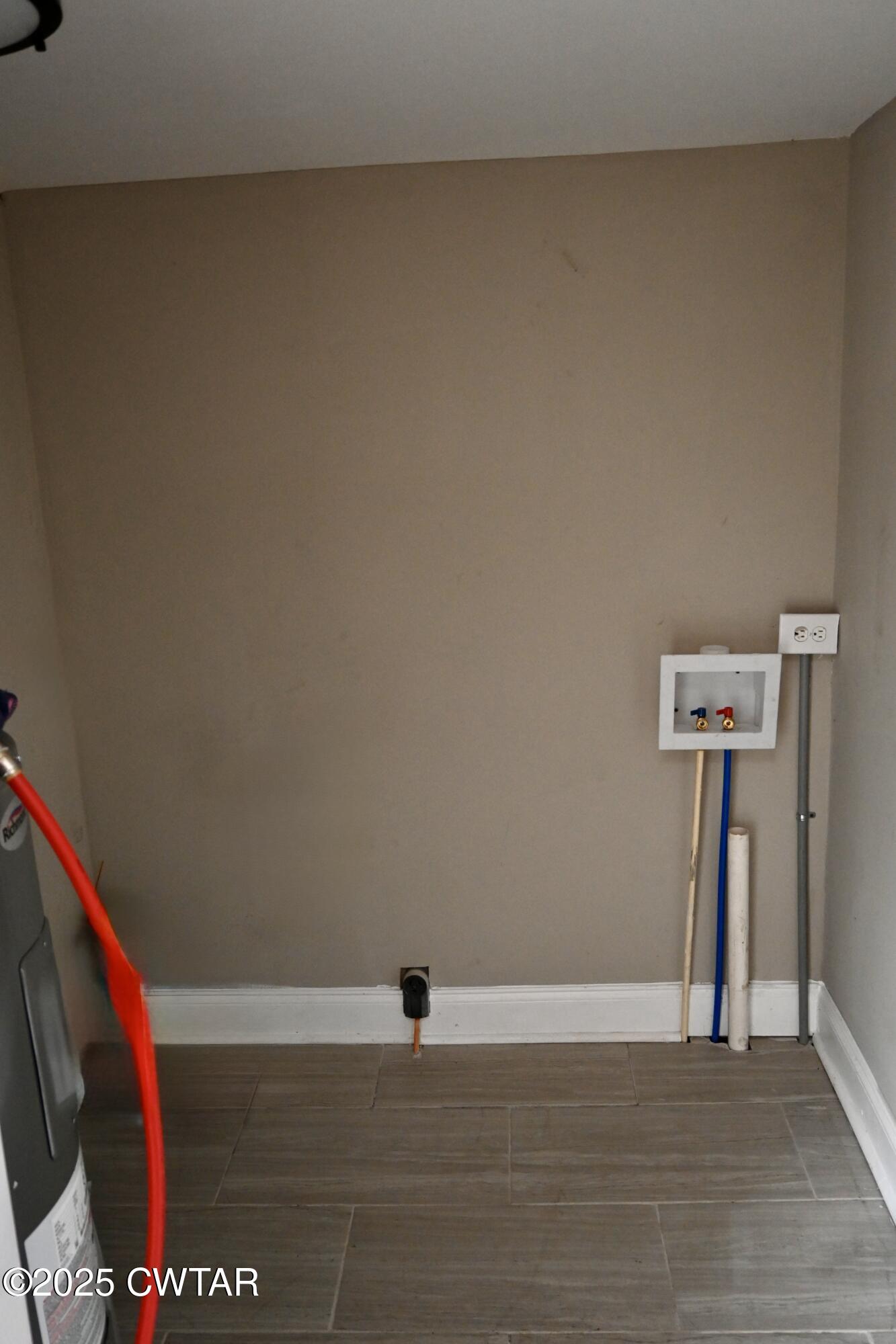 425 North McCombs Street Martin, TN 38237 - Photo 15 of 21 a view of a room with wooden floor and a book shelf