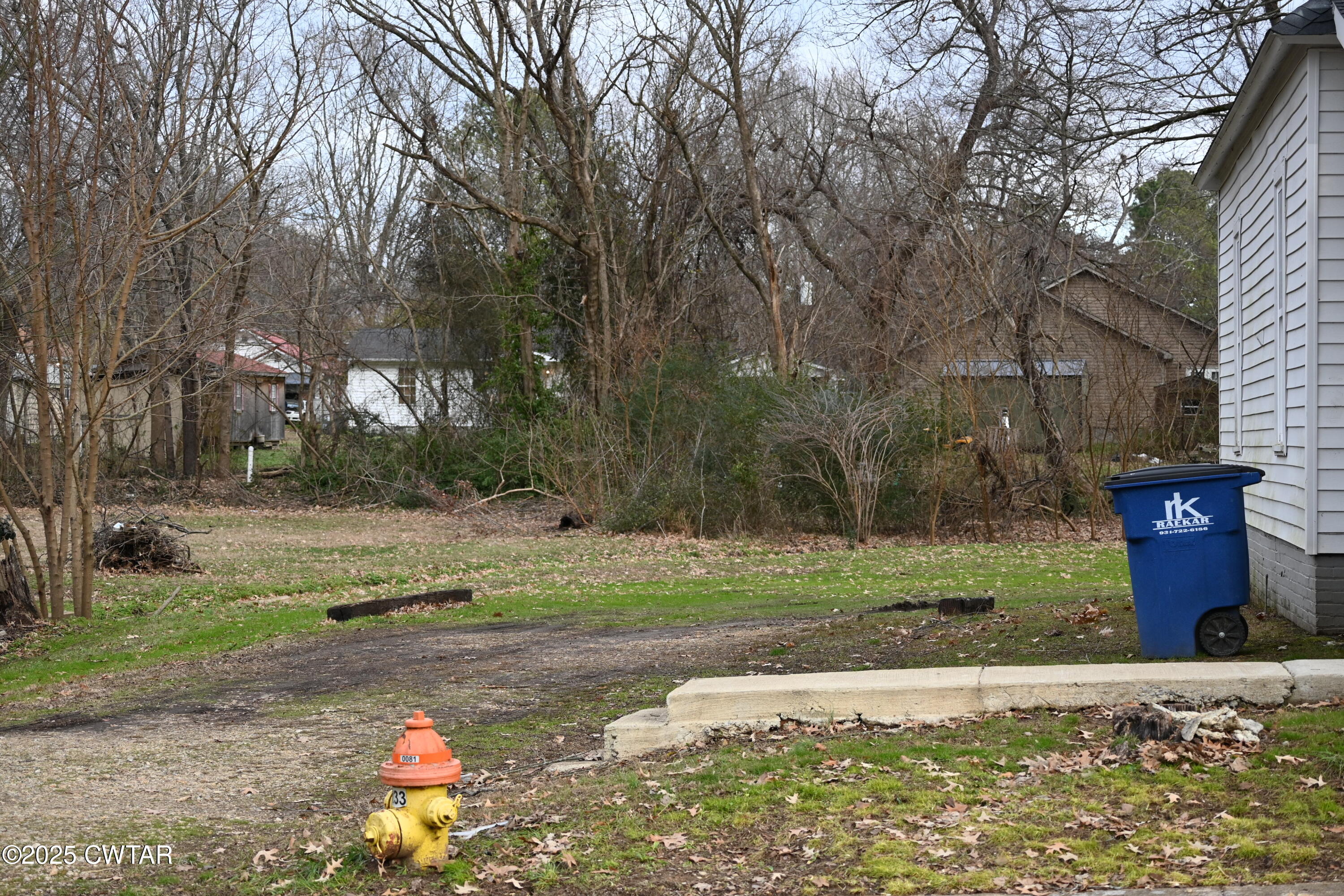 425 North McCombs Street Martin, TN 38237 - Photo 21 of 21 a street view with large trees