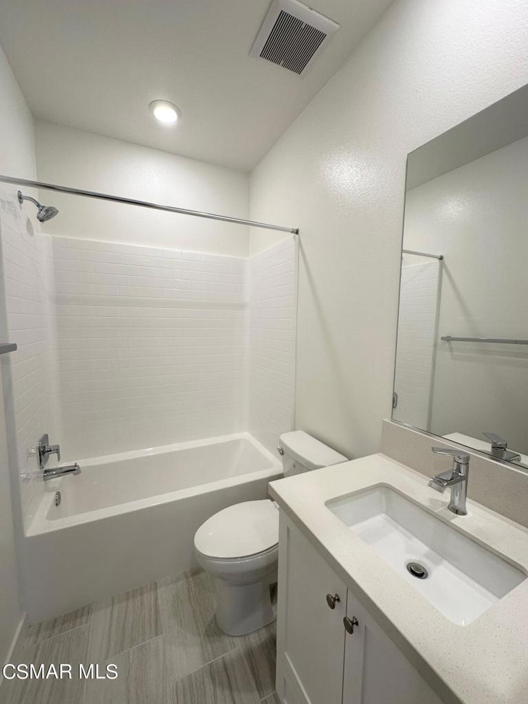 10726 Telegraph Road Ventura, CA 93004 - Photo 15 of 25 a bathroom with a sink a toilet and a bathtub