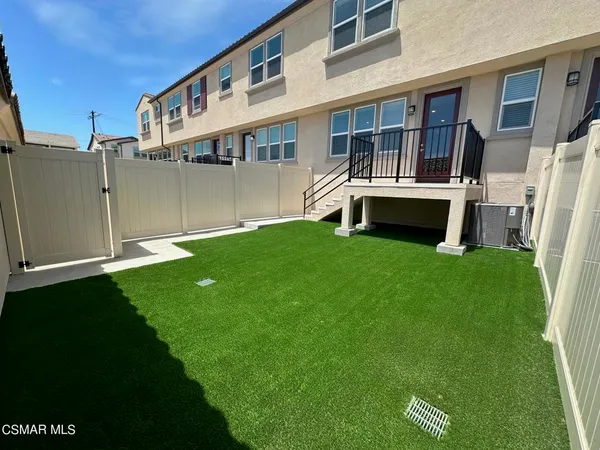a house view with a garden space