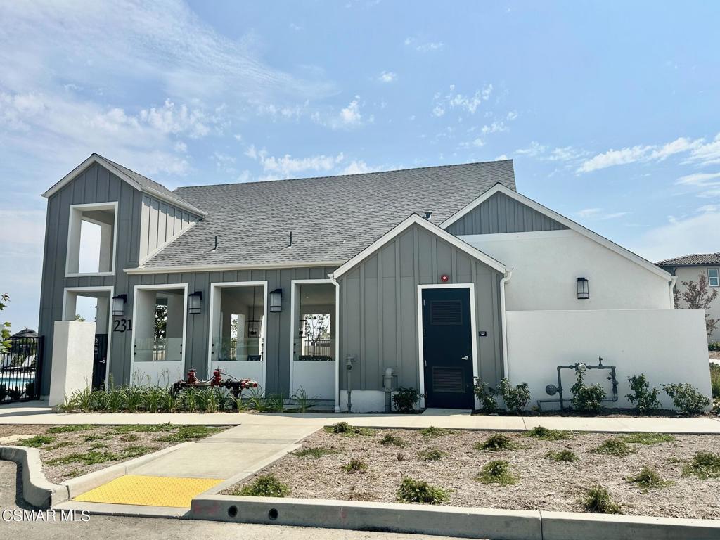 10726 Telegraph Road Ventura, CA 93004 - Photo 21 of 25 a view of a house with a yard and plants