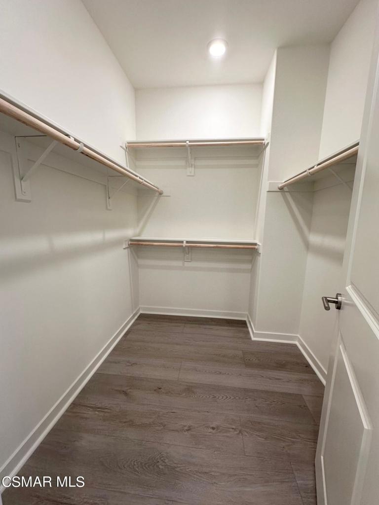 10726 Telegraph Road Ventura, CA 93004 - Photo 4 of 25 a view of an empty room with wooden floor