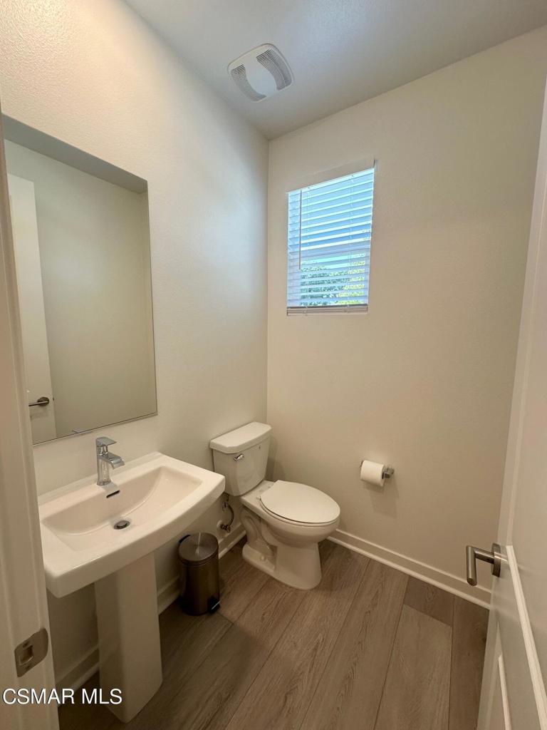 10726 Telegraph Road Ventura, CA 93004 - Photo 6 of 25 a bathroom with a sink and a toilet