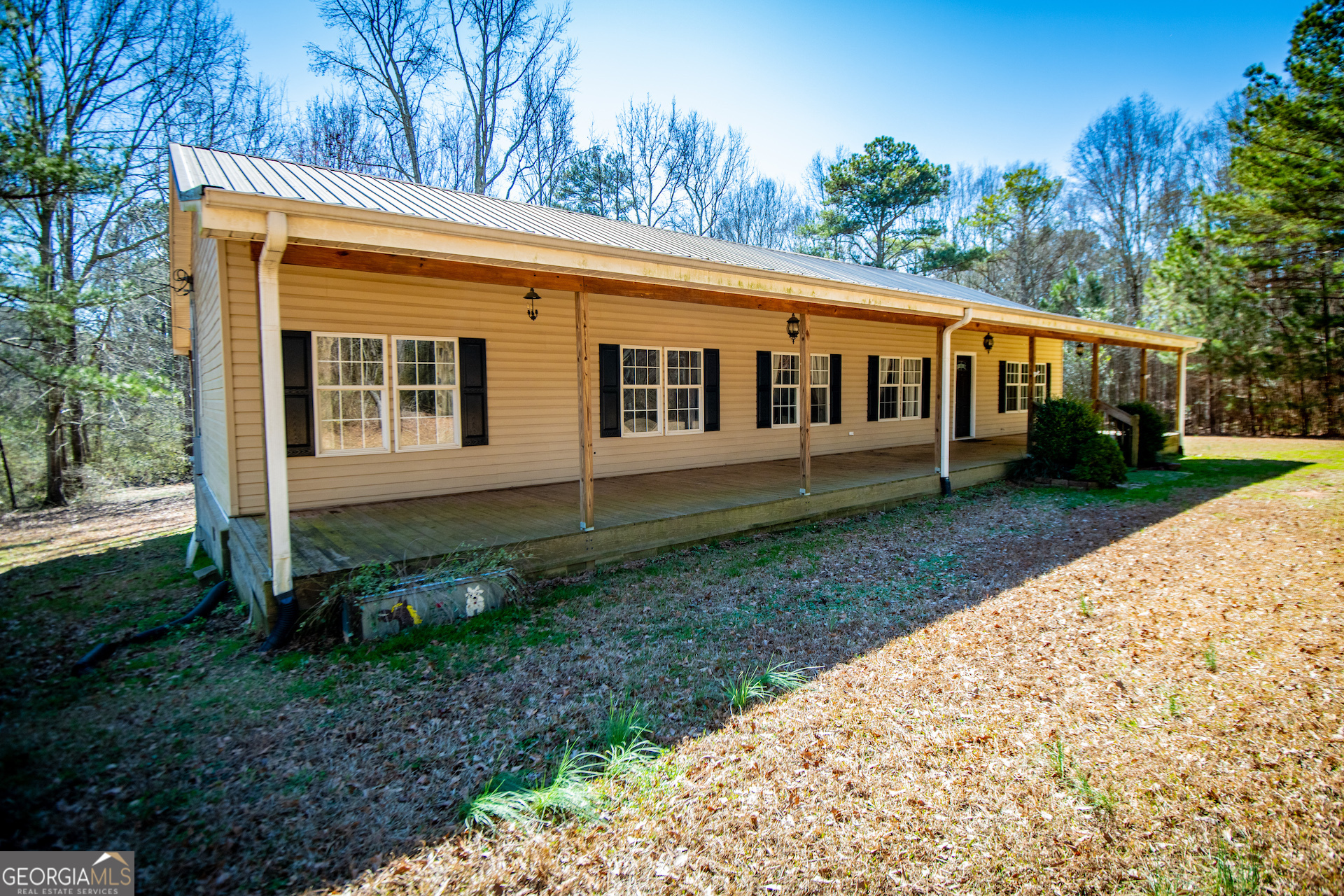 1592 Antioch Road Franklin, GA 30217 - Photo 1 of 1 a view of a house with backyard and garden