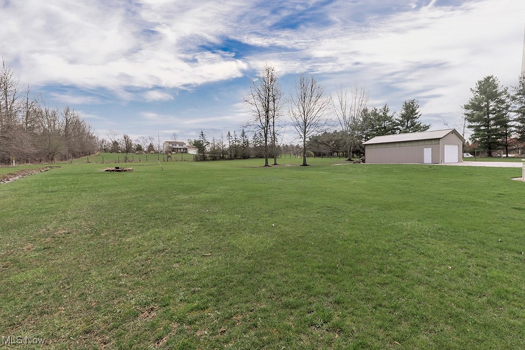 6881 Lake Road Medina, OH 44256 - Photo 31 of 34 View of yard featuring a garage and an outdoor structure