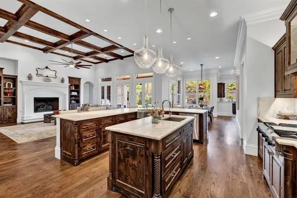 a kitchen with stainless steel appliances granite countertop a sink and a cabinets