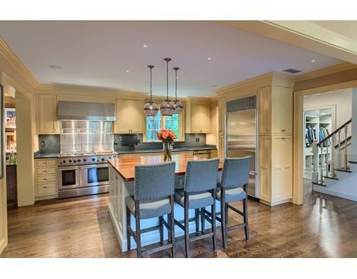 37 Garland Road Concord, MA 01742 - Photo 12 of 33 a large kitchen with a table and chairs