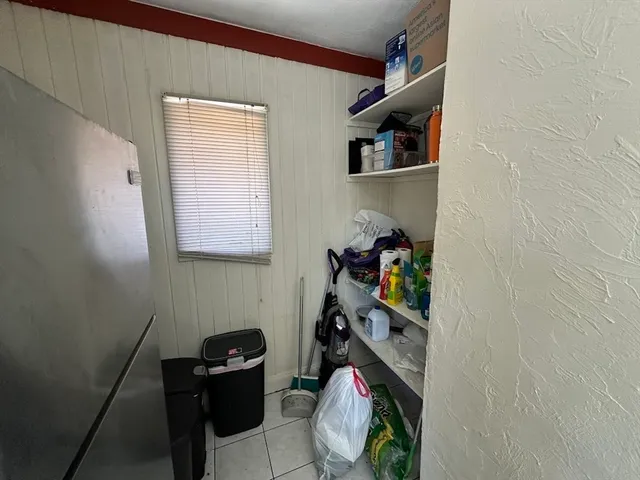 a room with storage and utility