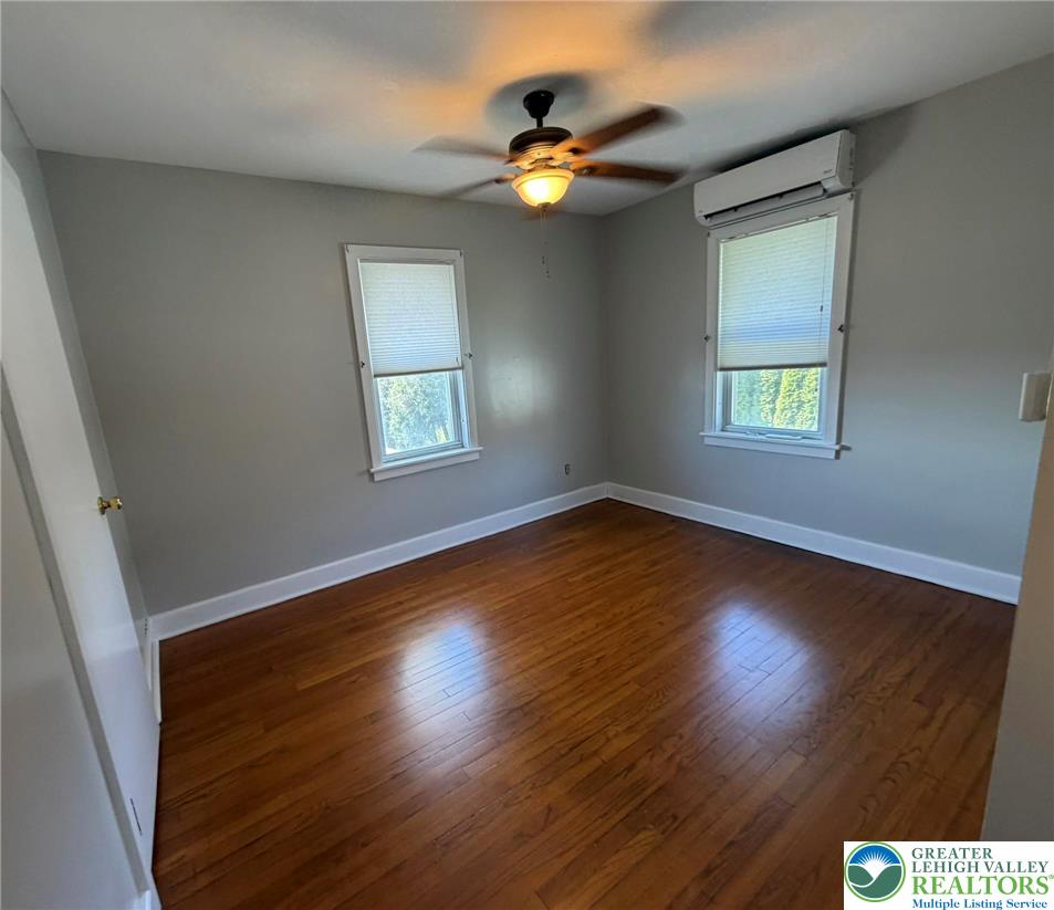 424 West Main Street Bath, PA 18014 - Photo 12 of 30 a view of an empty room with wooden floor and a window