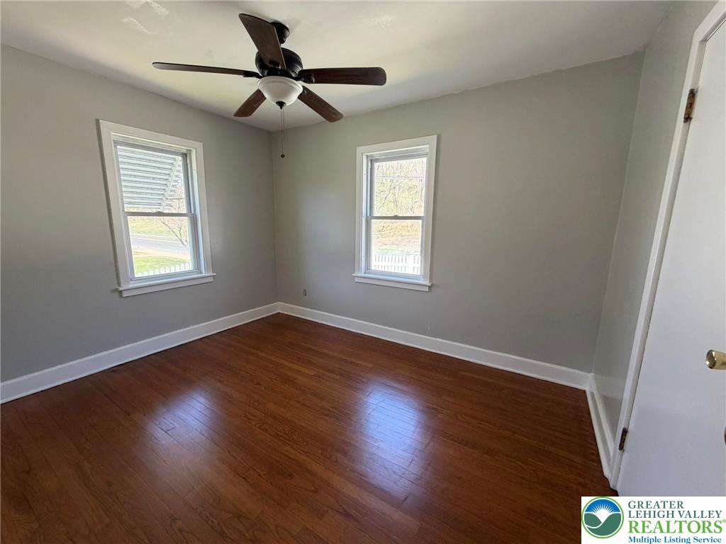 424 West Main Street Bath, PA 18014 - Photo 13 of 30 a view of an empty room with wooden floor and a window