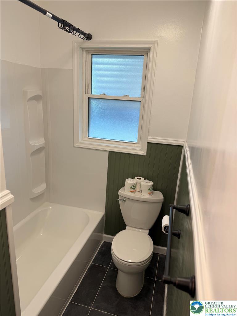 424 West Main Street Bath, PA 18014 - Photo 30 of 30 a bathroom with a toilet and a bathtub