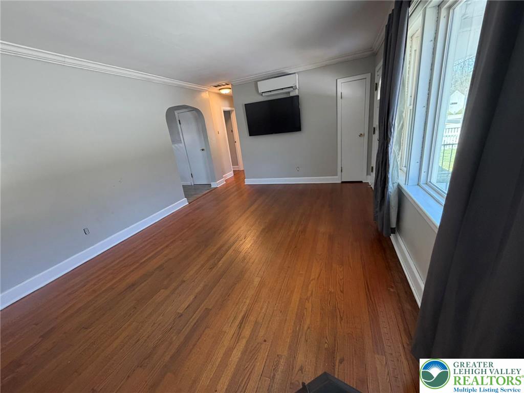 424 West Main Street Bath, PA 18014 - Photo 5 of 30 a view of a livingroom with wooden floor and a ceiling fan