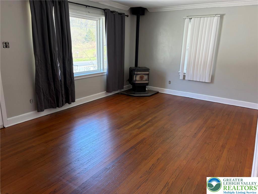 424 West Main Street Bath, PA 18014 - Photo 7 of 30 an empty room with wooden floor and windows