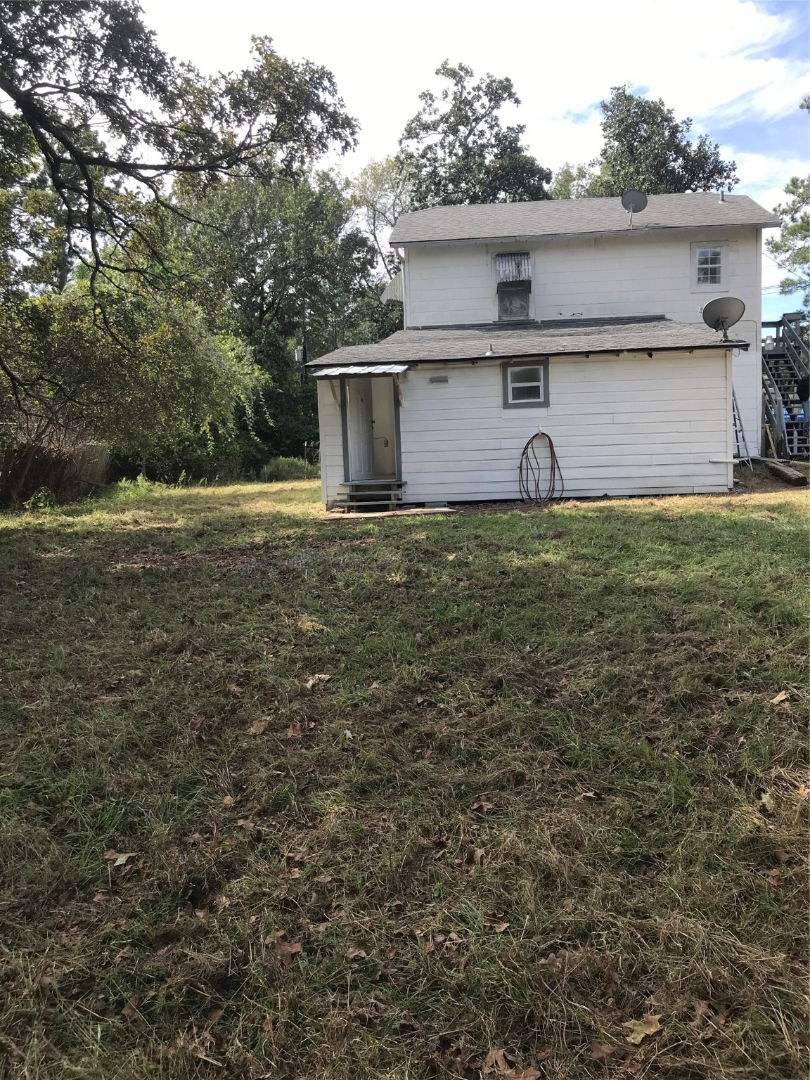 2909 Sam Houston Avenue Huntsville, TX 77340 - Photo 14 of 16 a view of a backyard