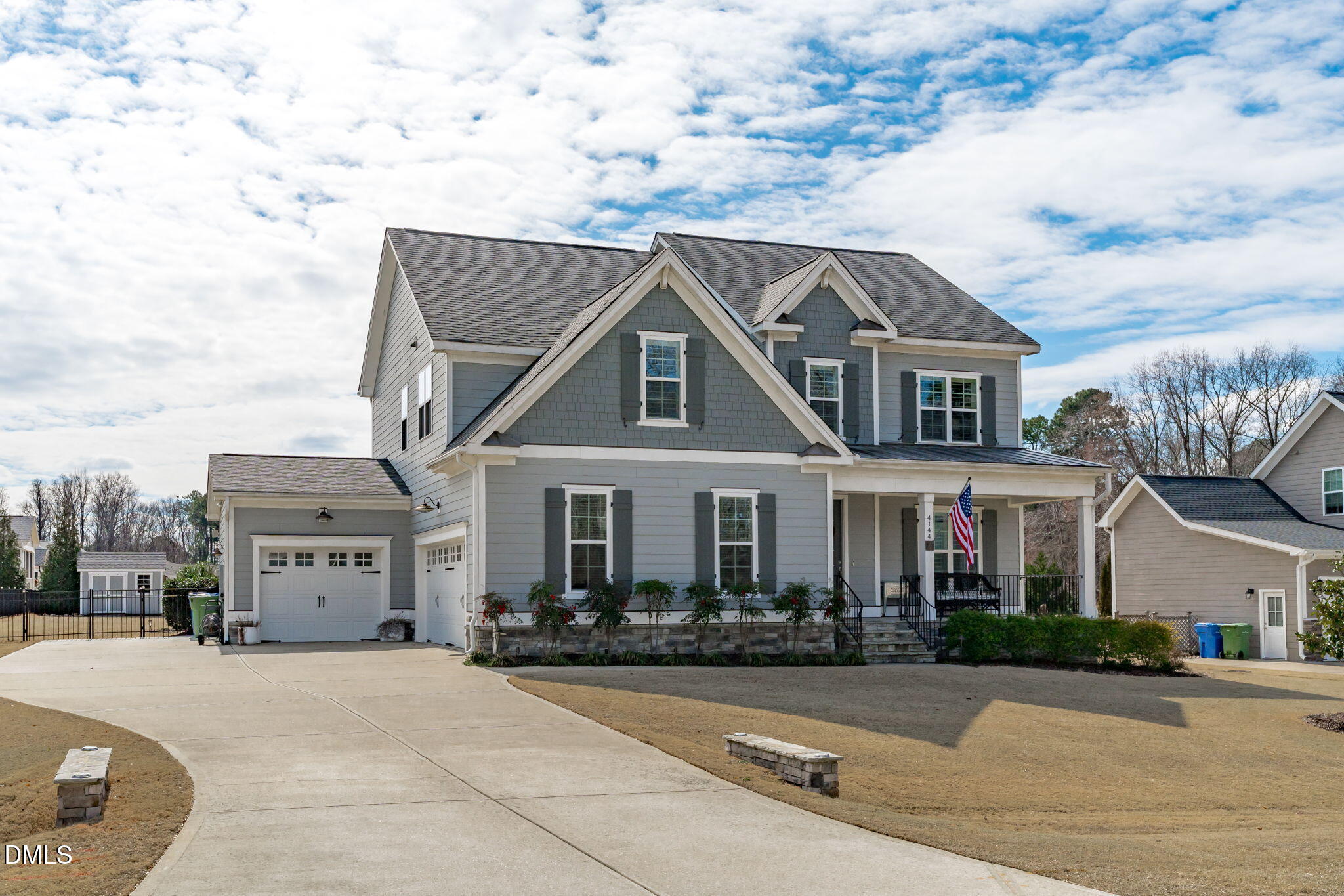 4144 Olde Judd Drive Willow Spring, NC 27592 - Photo 45 of 52 a front view of a house with a yard and garage