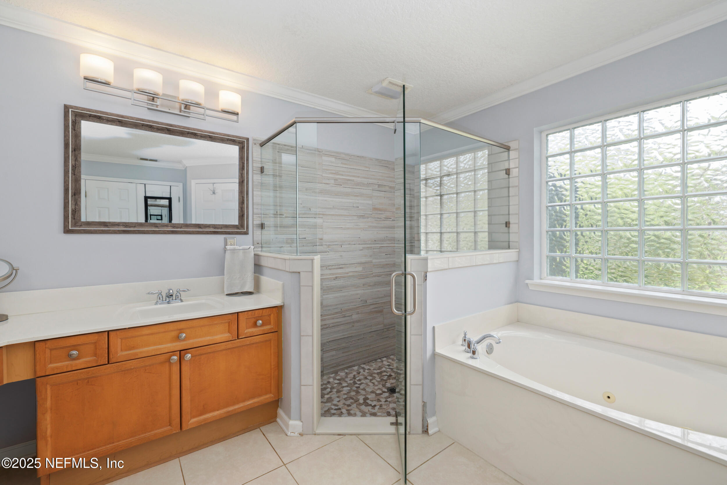 1256 Splendid Ravine Street St. Augustine, FL 32092 - Photo 11 of 36 Primary Bathroom with Garden Tub