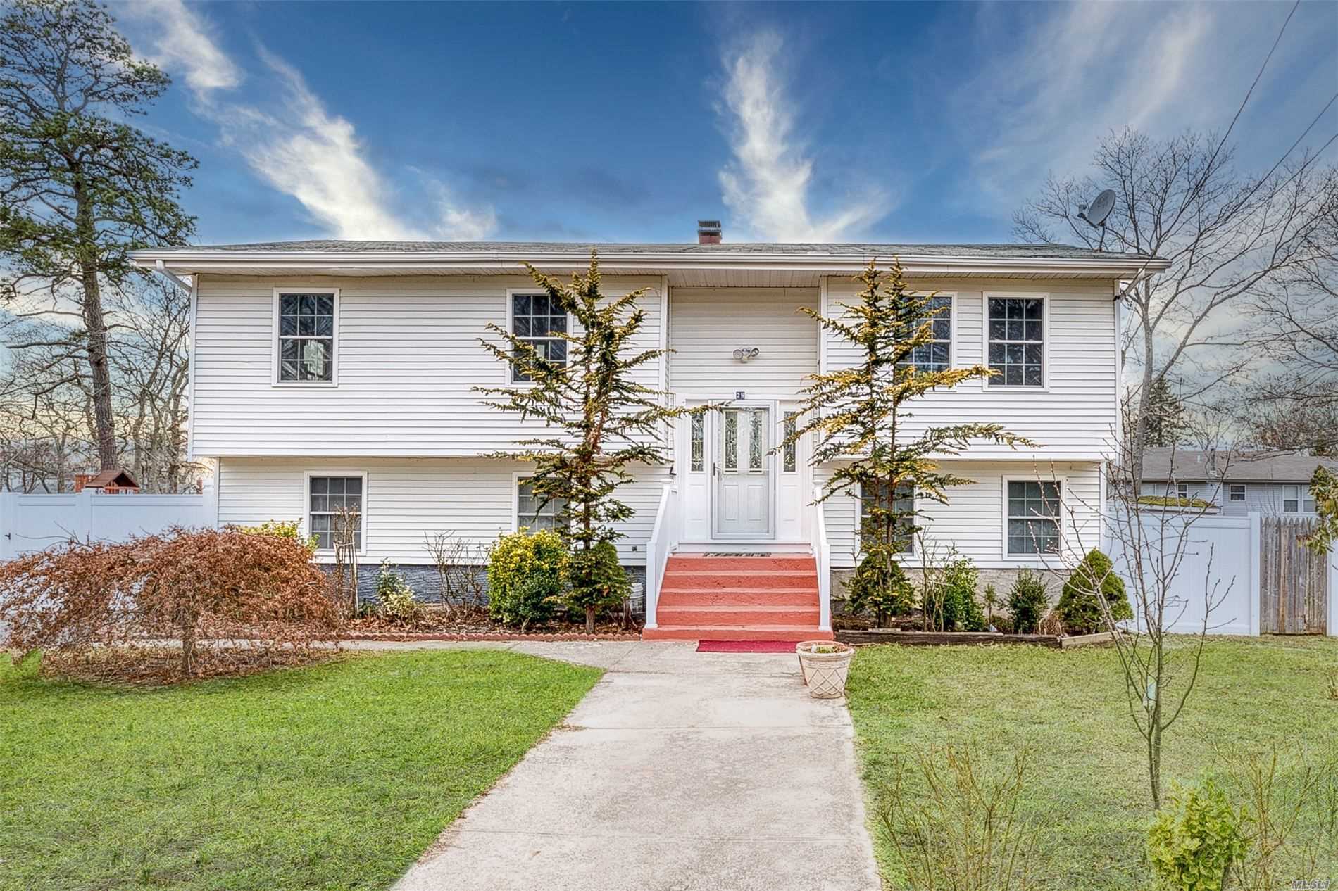 28 Heston Road Shirley, NY 11967 - Photo 1 of 1 a front view of house with yard