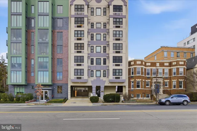 a front view of a building with street view