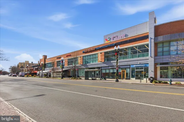 a front view of building with street