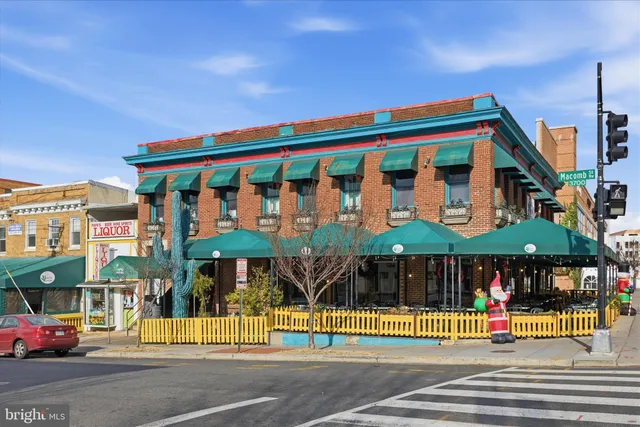 a front view of a building with street