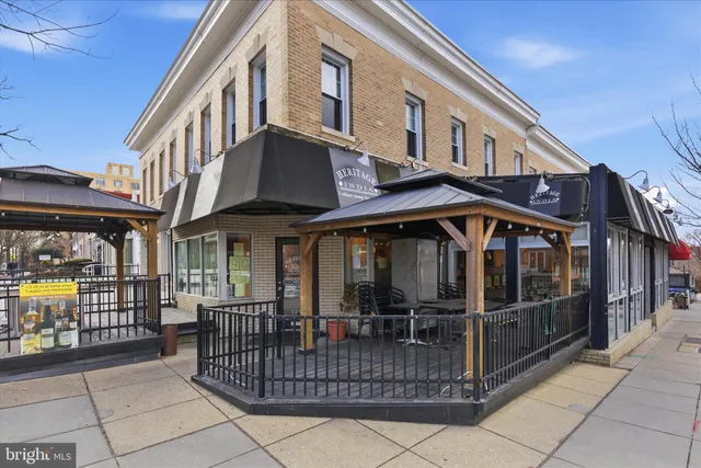a view of a building with a glass door