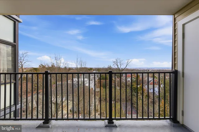 a view of balcony with wooden floor