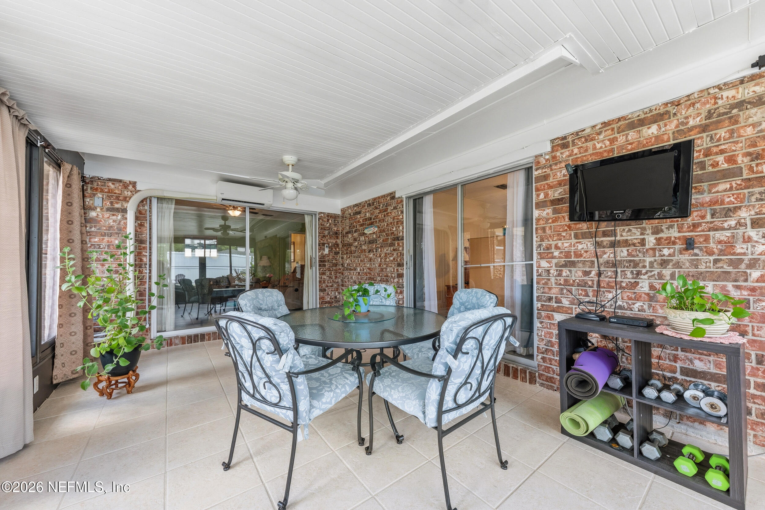 7255 Floral Ridge Drive Jacksonville, FL 32277 - Photo 22 of 25 Enclosed Sunroom with Split A/C