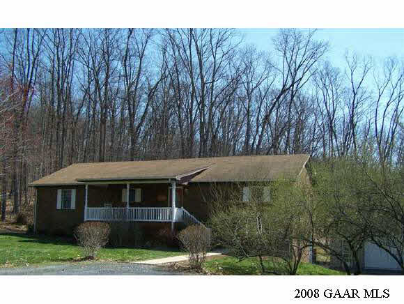 661 Pine Bluff Road Waynesboro, VA 22980 - Photo 1 of 4 a front view of a house with a yard