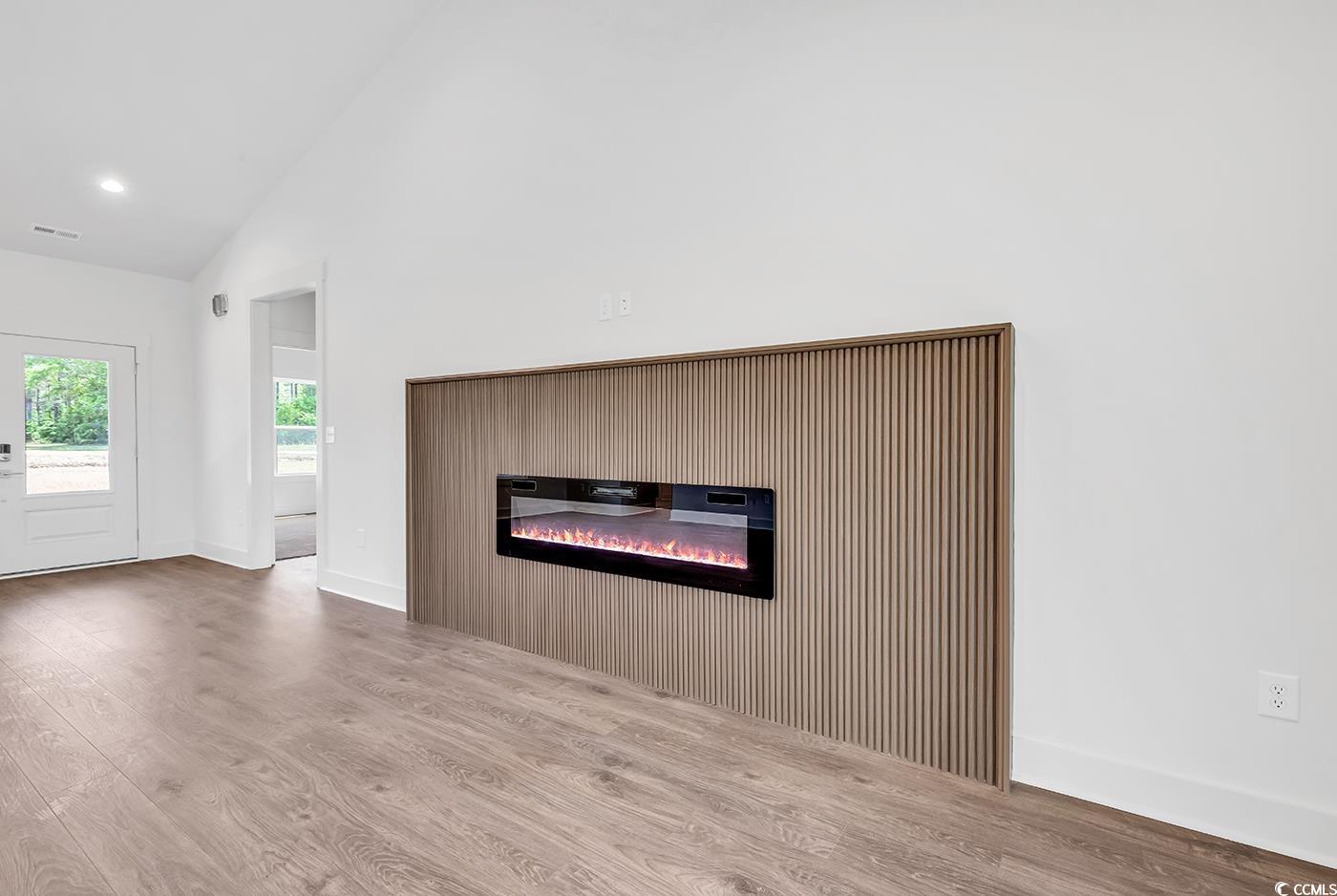 718 Highway 348 Loris, SC 29569 - Photo 11 of 28 Fireplace with wood surround