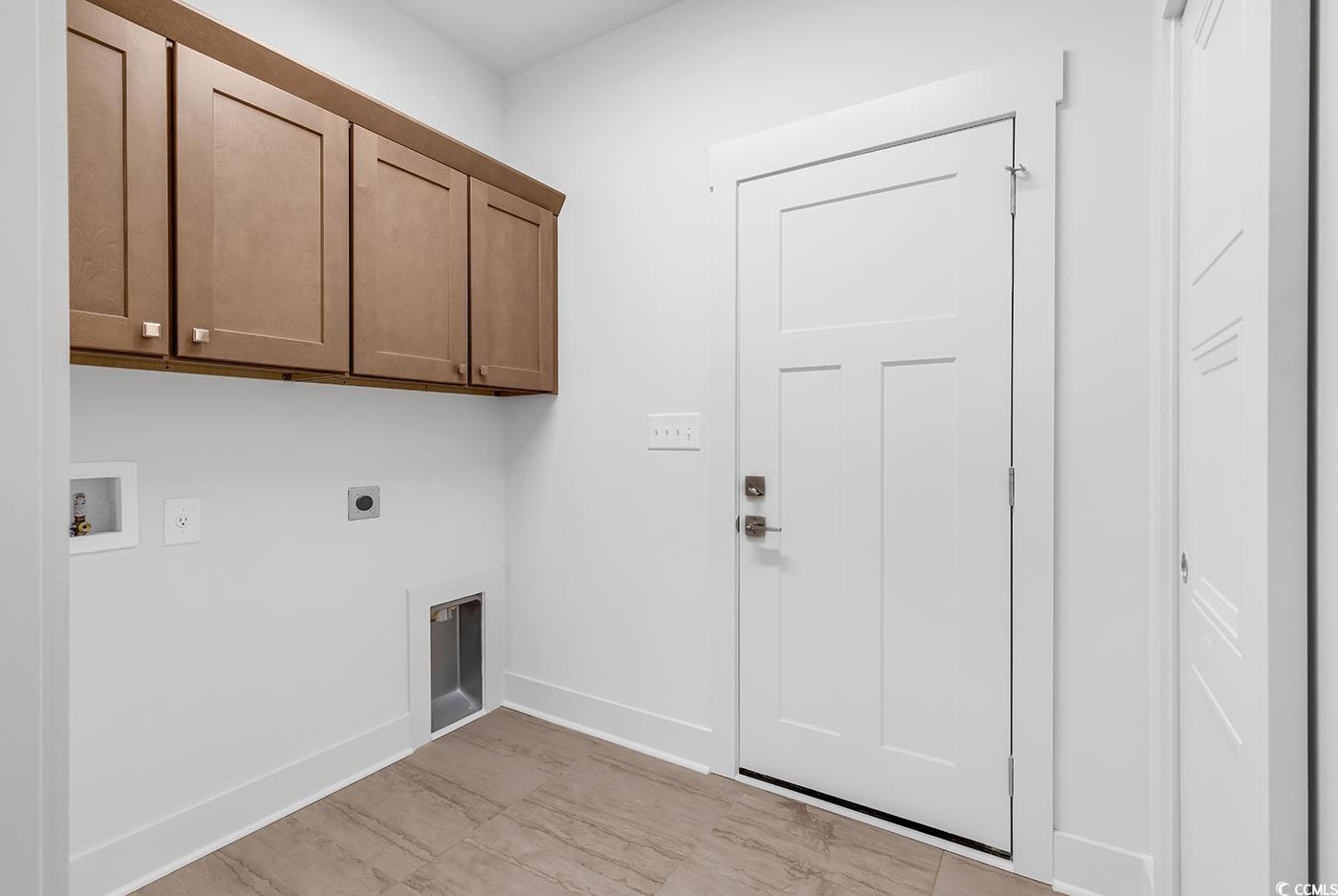 718 Highway 348 Loris, SC 29569 - Photo 17 of 28 Laundry Room featuring cabinet storage, electric washer and dryer hookup, and oversized pantry