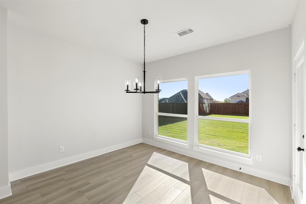 1285 Flamingo Road Forney, TX 75126 - Photo 24 of 40 a view of a room with a large window