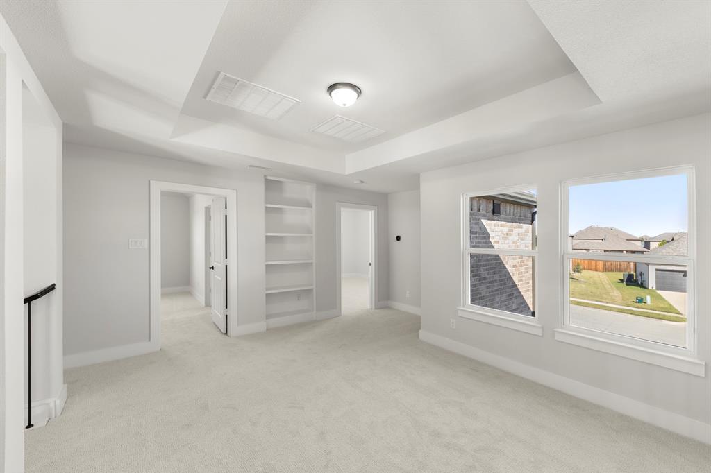 1285 Flamingo Road Forney, TX 75126 - Photo 33 of 40 a view of an empty room with a window