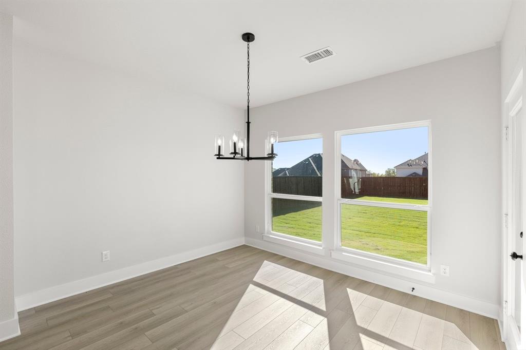 1285 Flamingo Road Forney, TX 75126 - Photo 10 of 40 a view of a room with a large window