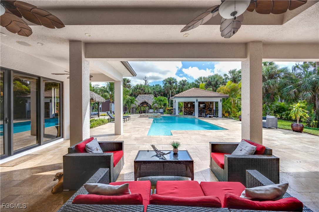 214 9th Street Northwest Naples, FL 34120 - Photo 33 of 49 a outdoor space with patio