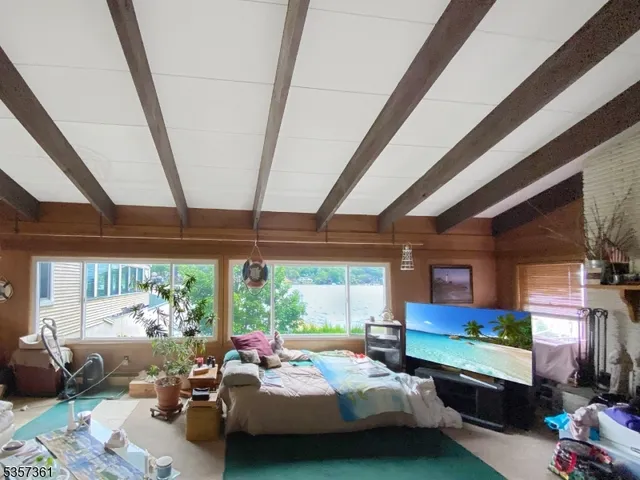 a room with furniture and a large window