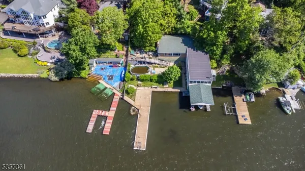 an aerial view of house with yard