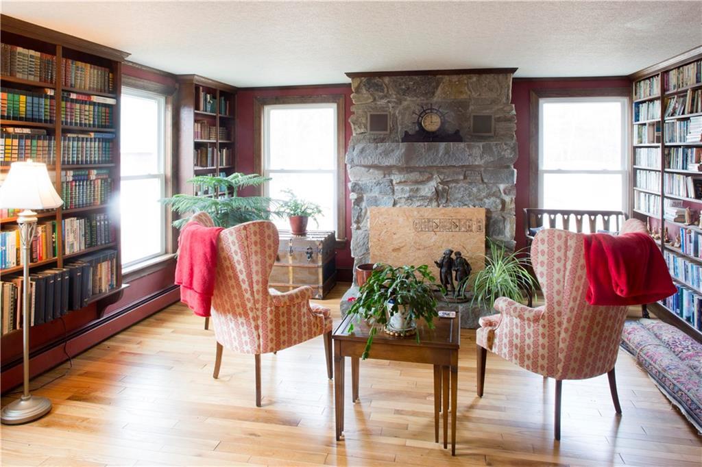 71 Goshen Road Winterport, ME 04496 - Photo 16 of 35 Granite fireplace in library with...