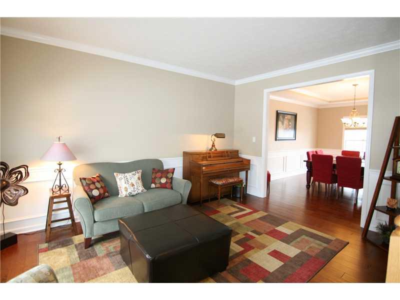 Living Room. The living room is open to the dining room for easy entertaining...