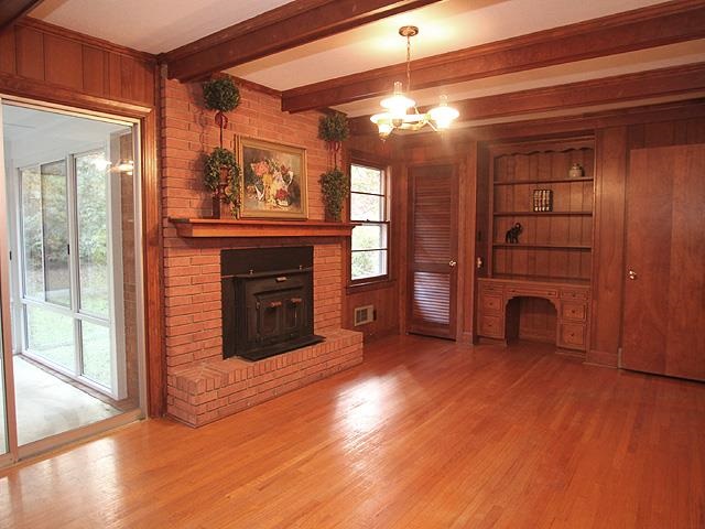 6700 Johnsdale Road Raleigh, NC 27615 - Photo 6 of 14 a view of a livingroom with a fireplace and window