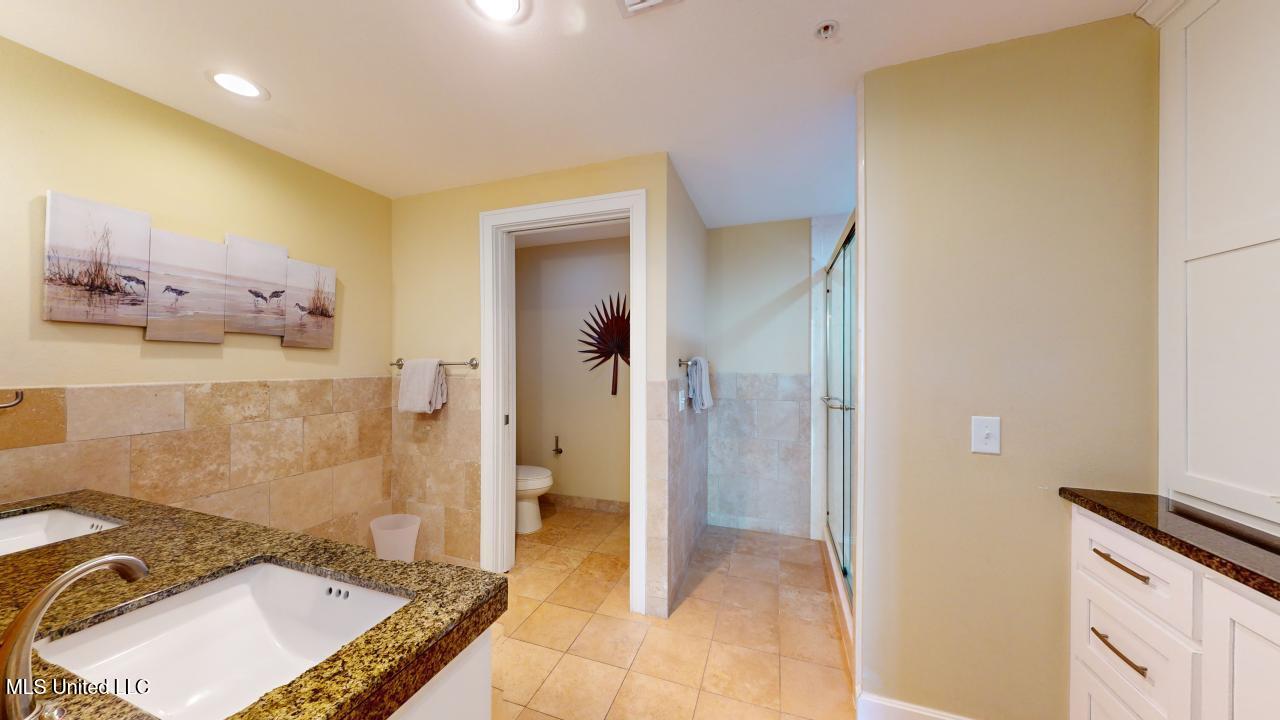 2060 Beach Boulevard, Unit 1207 Biloxi, MS 39531 - Photo 13 of 26 1207-Primary Ensuite 2