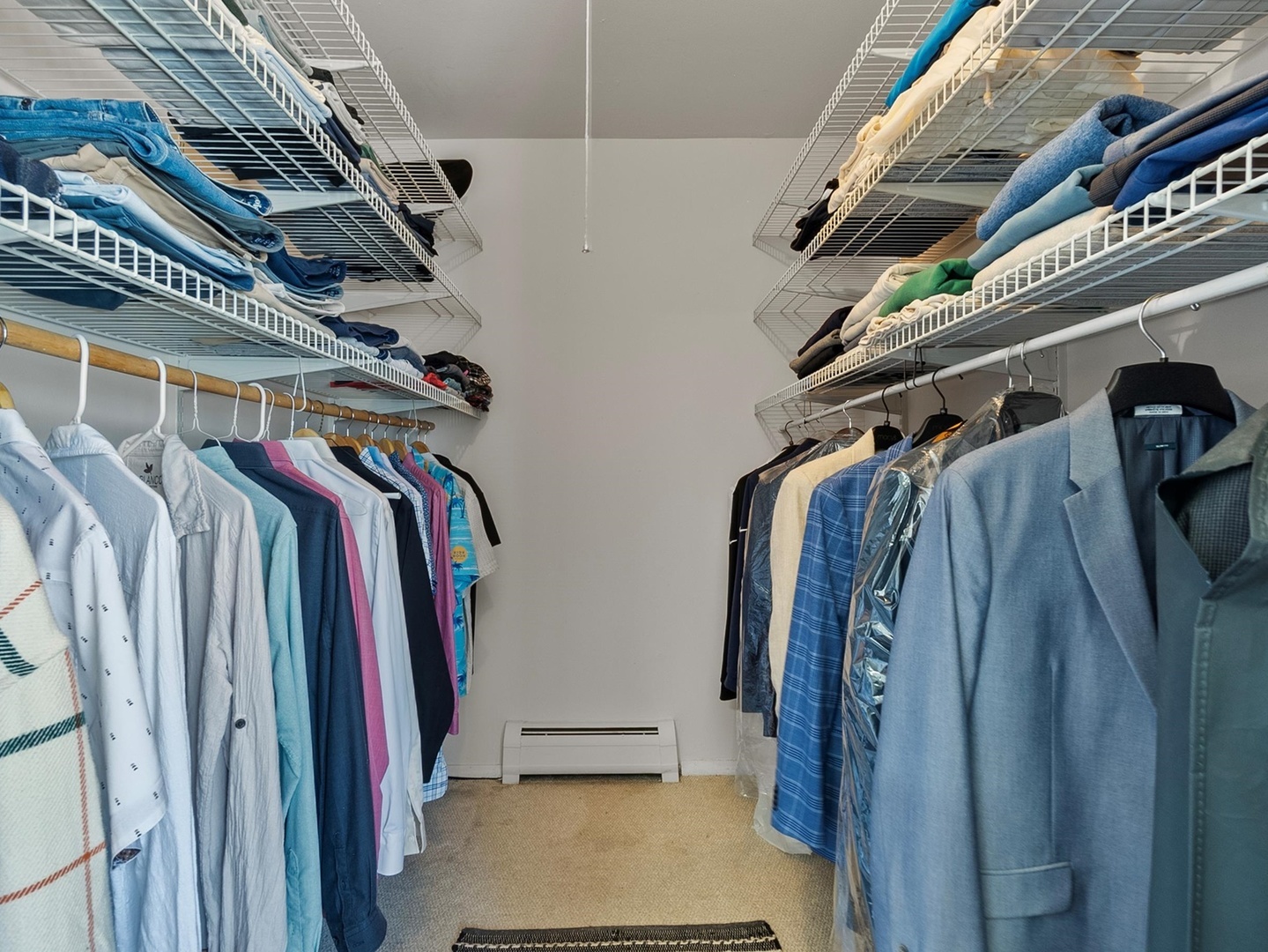 940 East Old Willow Road, Unit 305 Prospect Heights, IL 60070 - Photo 12 of 18 a view of walk in closet with clothes and shoes